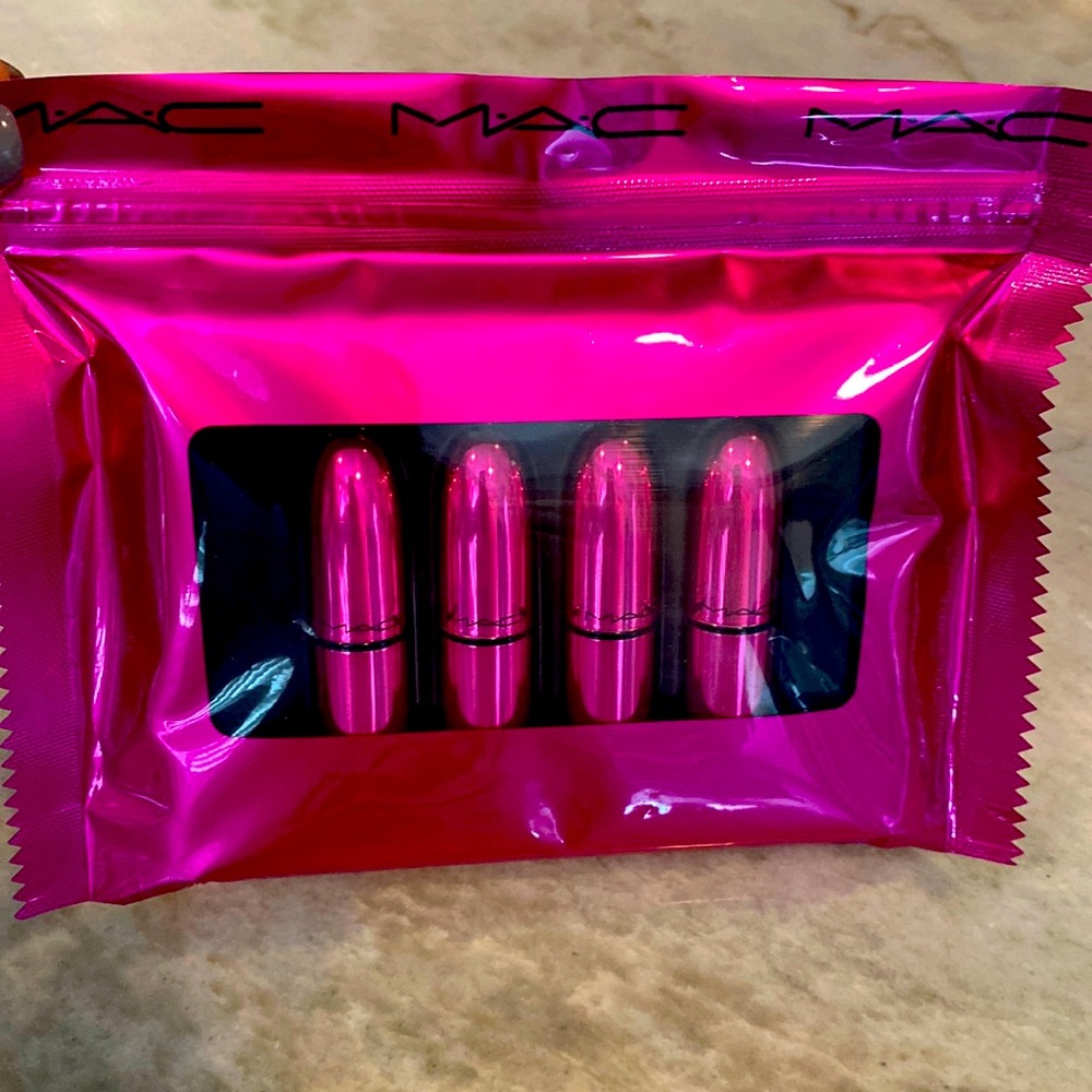MAC lipsticks set of 4 in sealed pouch.